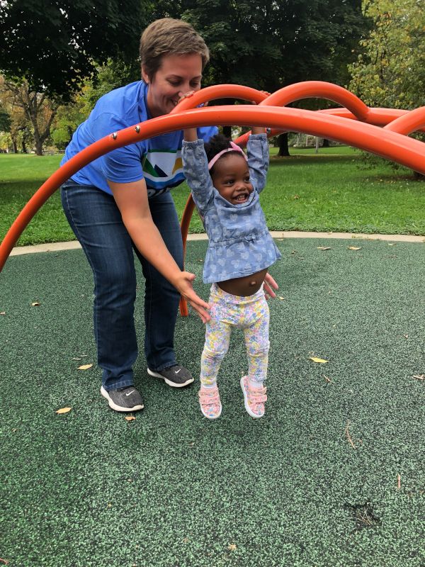 Lianne Helping Tia at the Playground