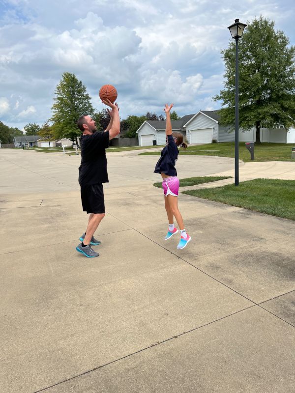 Rob & Emily Playing Basketball in Our Driveway