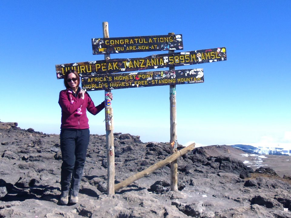 Anna at the Summit of Mount Kilimanjaro