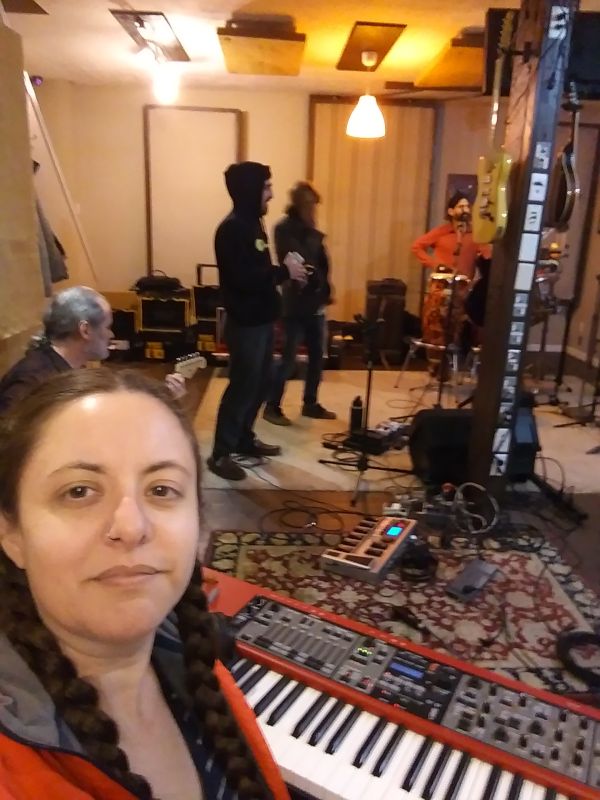 Gina in the Recording Studio With the Band