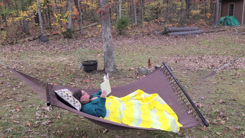 Kayla Reading in Her Favorite Spot at Home