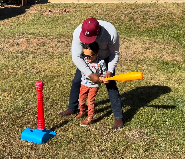 Antonio Teaching Carter How to Play Baseball