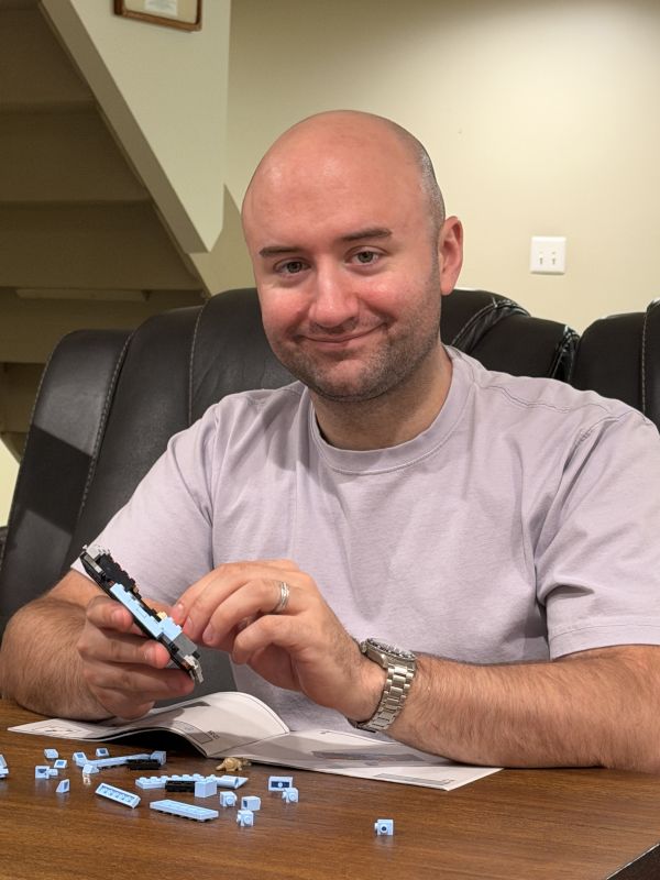 Chris Putting Together a LEGO