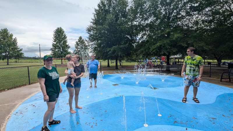 Having Fun at a Splashpad with the Godparents!