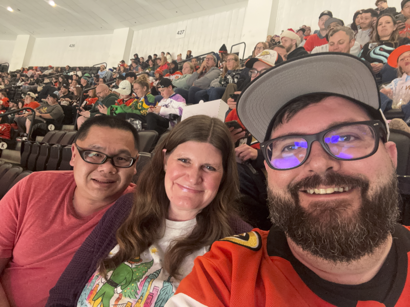 Enjoying a Hockey Game With Jennifer's Brother