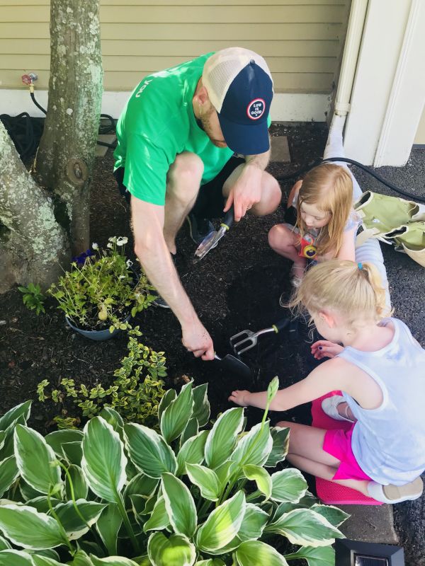 Our Nieces Helping Kevin Plant Flowers